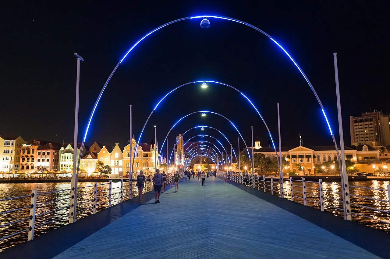 Illuminated Queen Emma Bridge at night